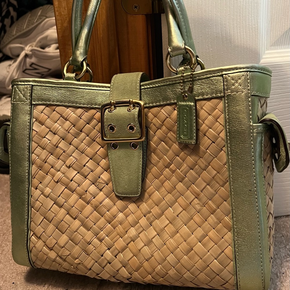 Coach Straw Bag. I bought used, and never used it. Flawless.